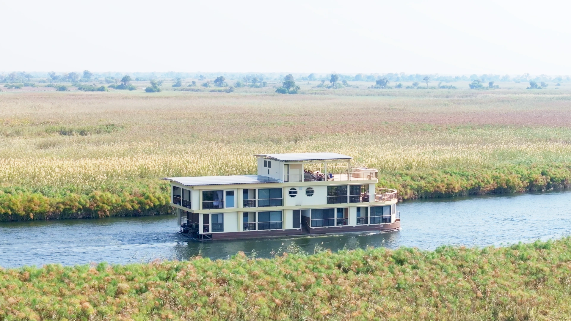 The Okavango Endeavour moored against papyrus reeds in the Okavango Delta