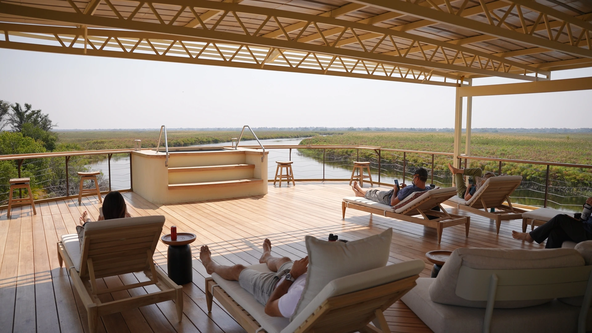 Sun deck with plunge pool aboard the Okavango Endeavour, overlooking the delta